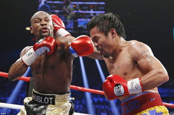 2842708600000578-3065798-Floyd_Mayweather_s_had_too_much_for_Manny_Pacquiao_right_at_the_-a-5_1430646539827